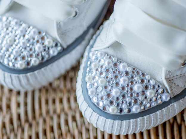 BK trainers with white satin laces and pearls and diamontes on the toes