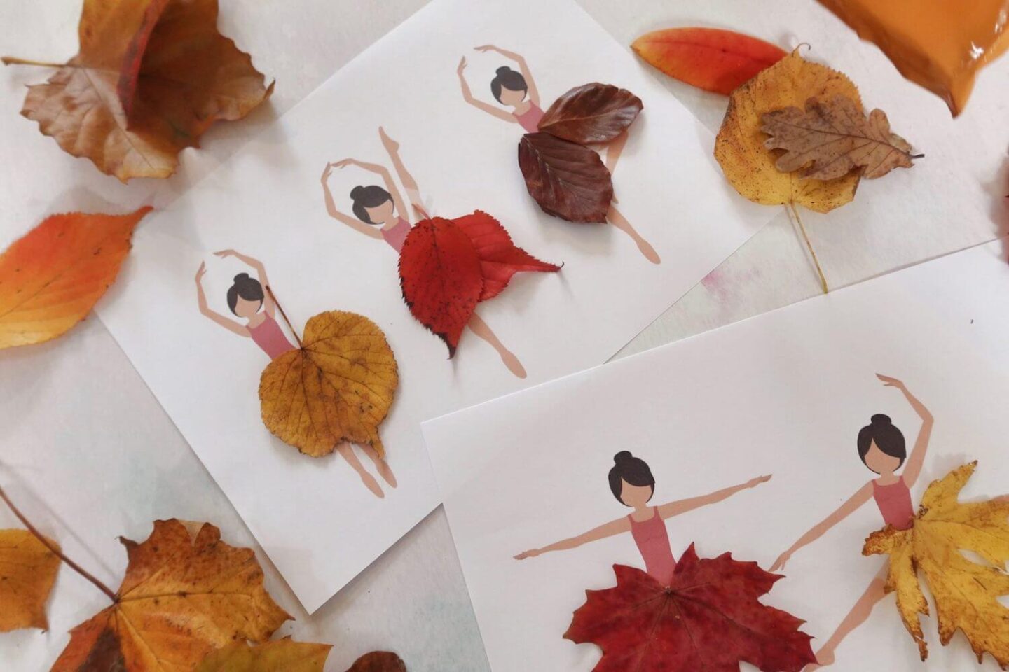 A printable of ballerinas with autumn leaves used as dresses