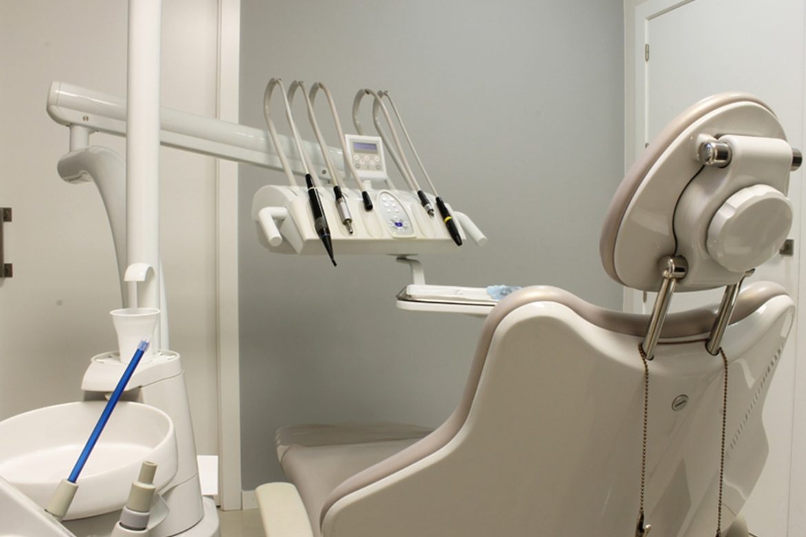 A dentist chair and tools