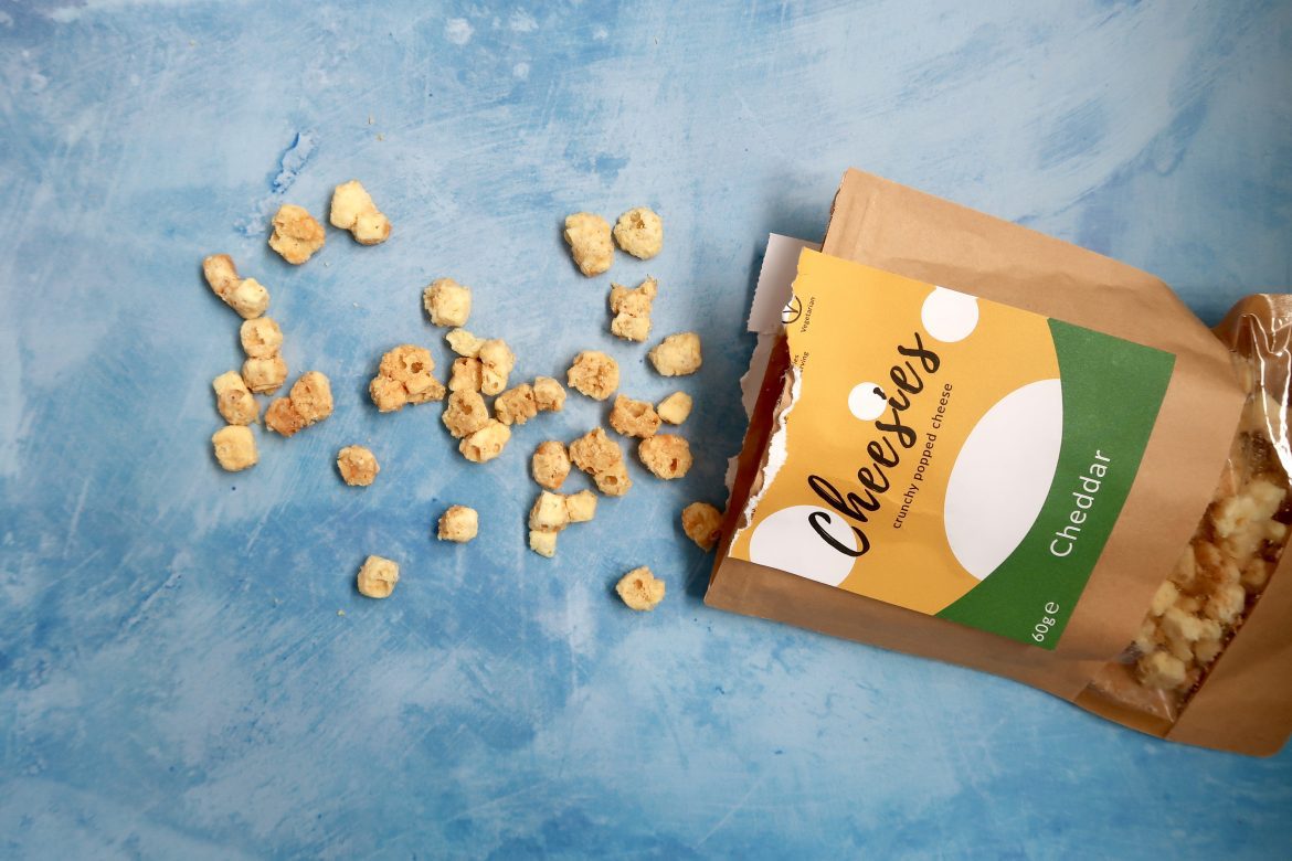 An open pack of cheesies 