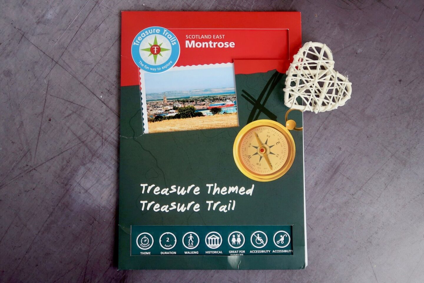 A paper folder containing a Treasure Trails Montrose set