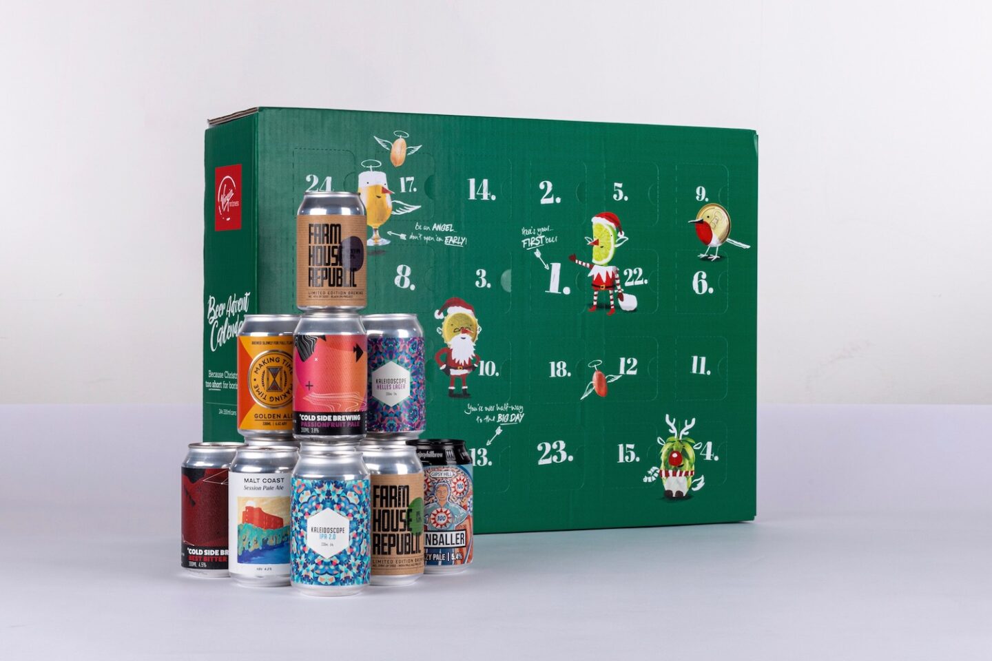 A green beer advent calendar with a stack of beer cans in front of it