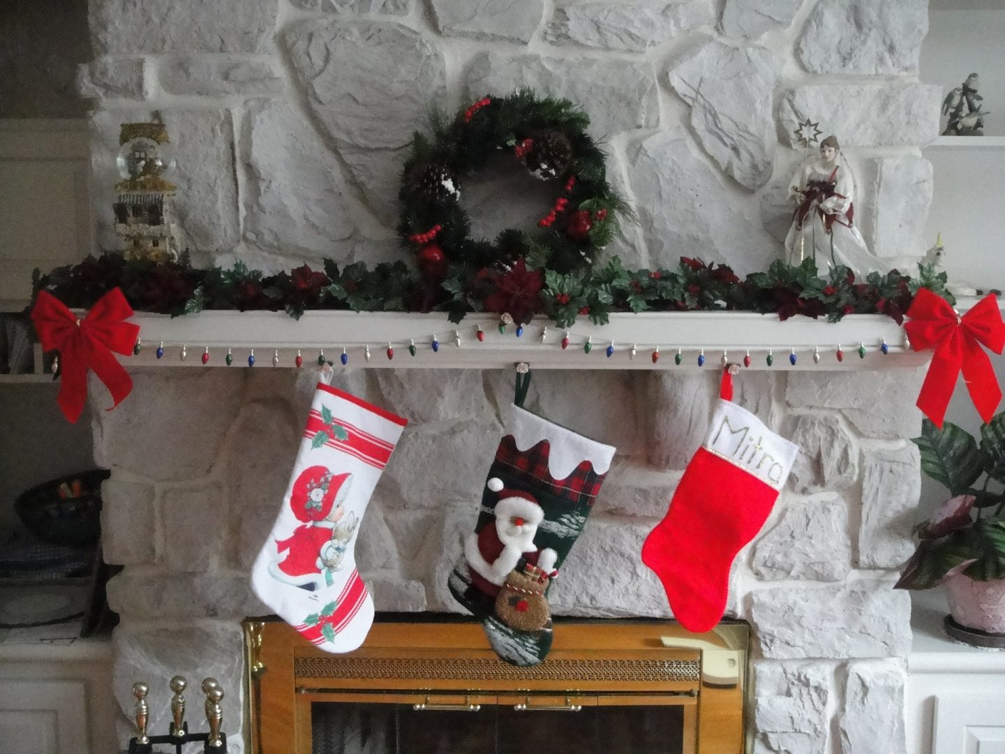 Christmas stockings hanging on a fireplace