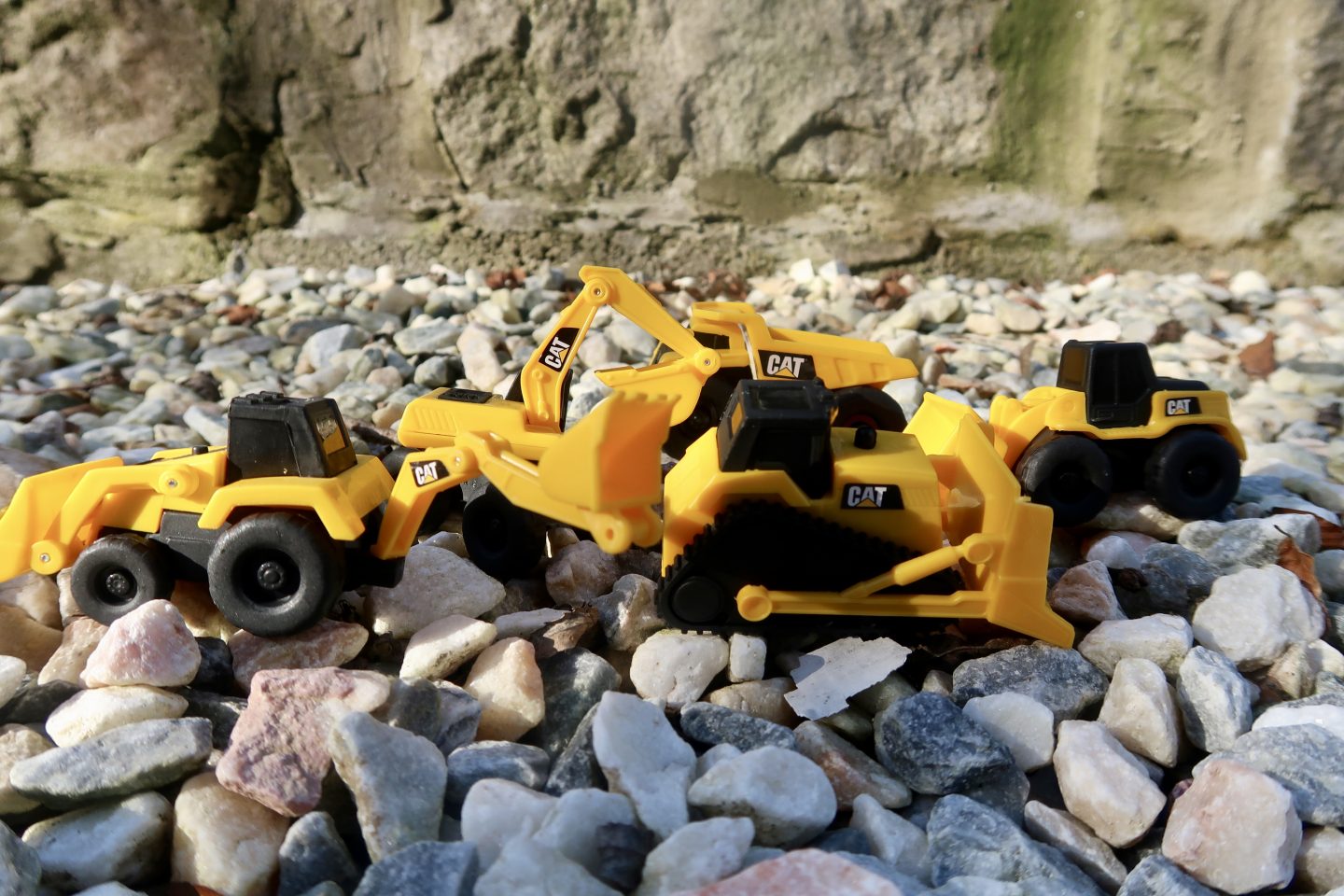 A collection of Cat toy vehicles
