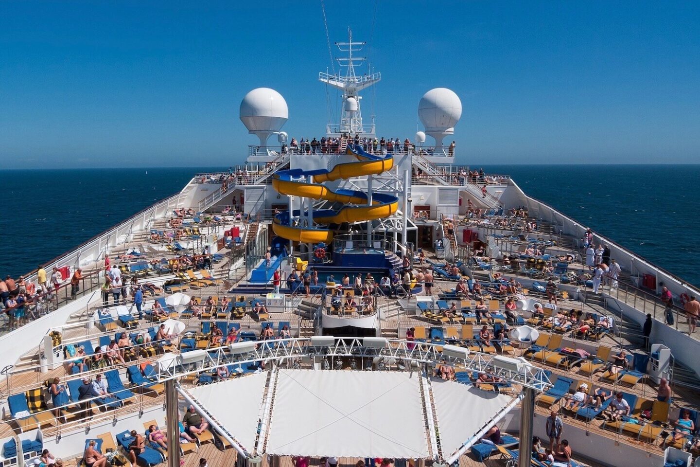 The deck of a cruise ship with a water slide