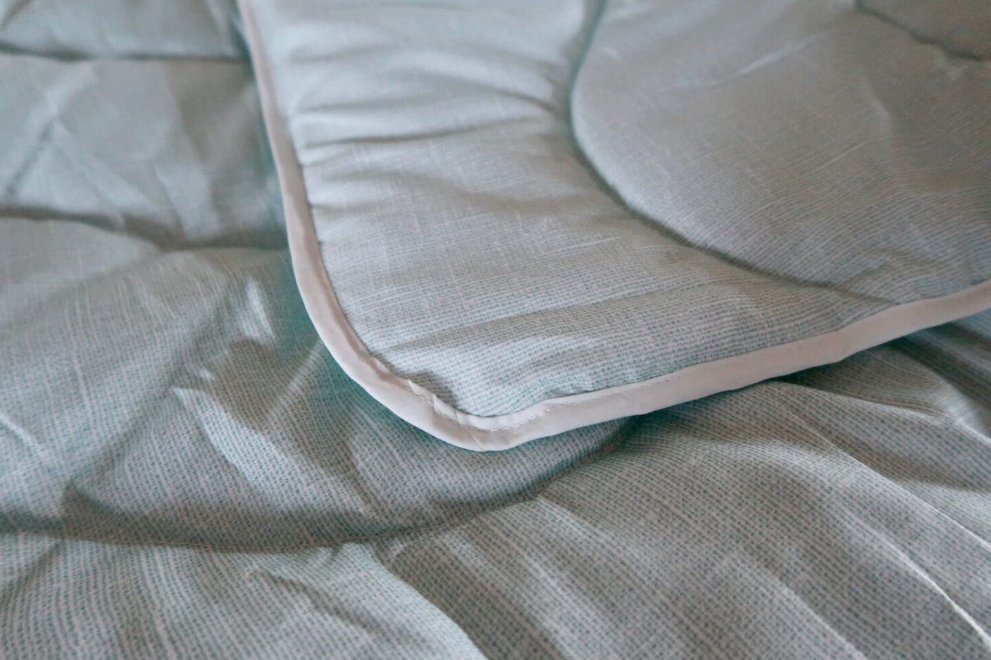 A coverless duvet folded over on itself