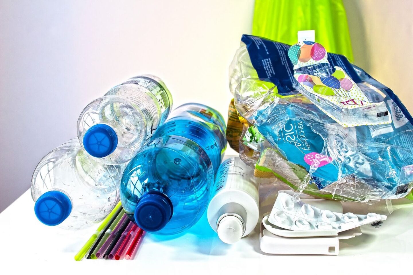 A stack of empty plastic bottles and recycling