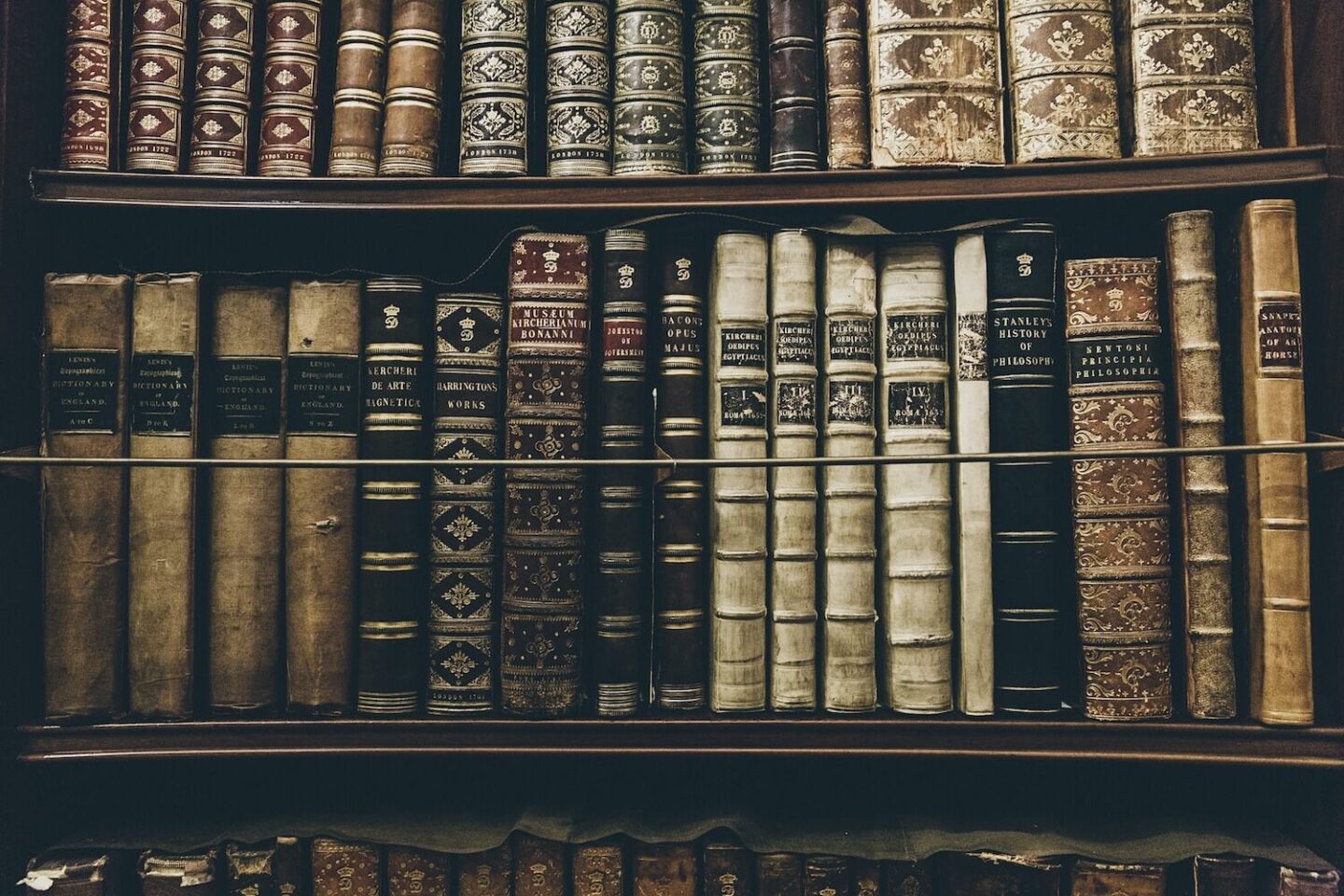 Old books on a library shelf