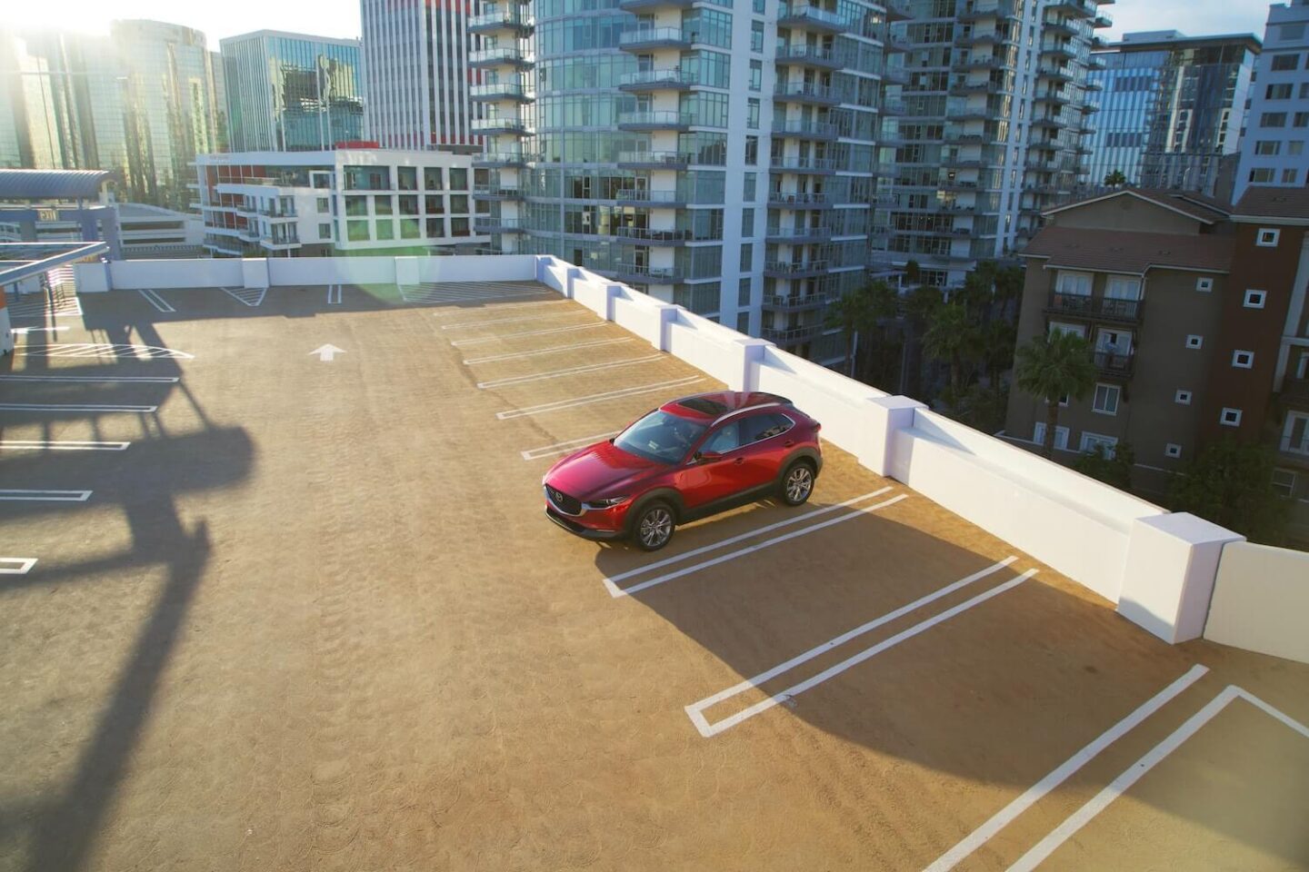 Red Mazda CX-30 Parked On A Rooftop Parking