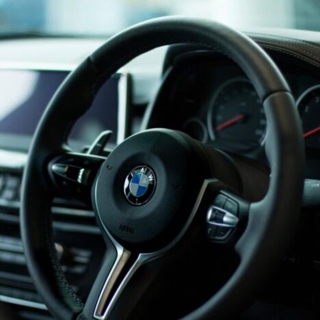 A black BMW steering wheel