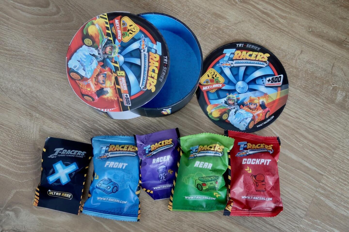A t-racer turbo wheel opened with the backs laid out on the ground next to it