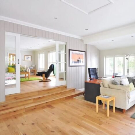 A living space in a house with a wooden floor