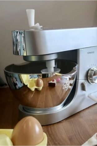 A toy food mixer with plastic food
