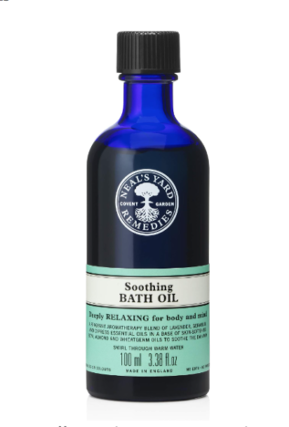 A blue bottle of Neal's Yard bath oil