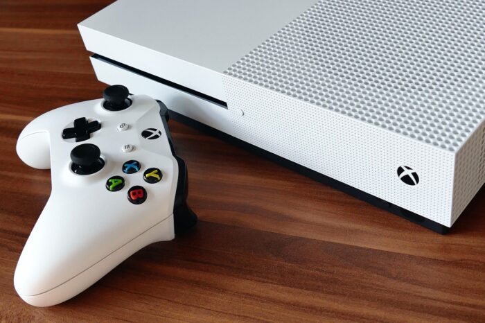 A white x-box and controller