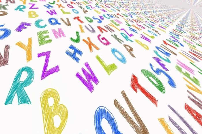Letters in bright colours across a page
